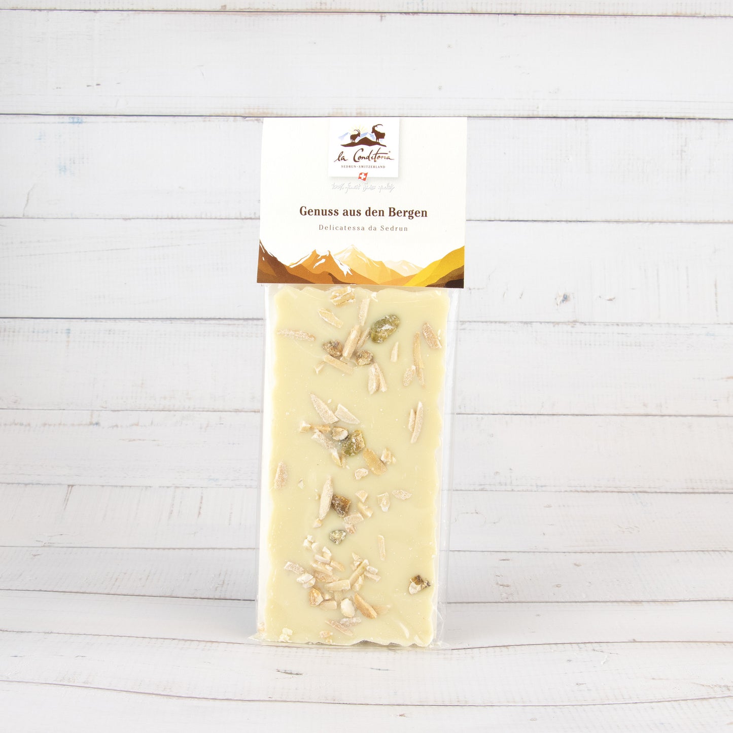 Weisse Schokolade mit karamellisierten Mandeln mit Pistazien, 100g